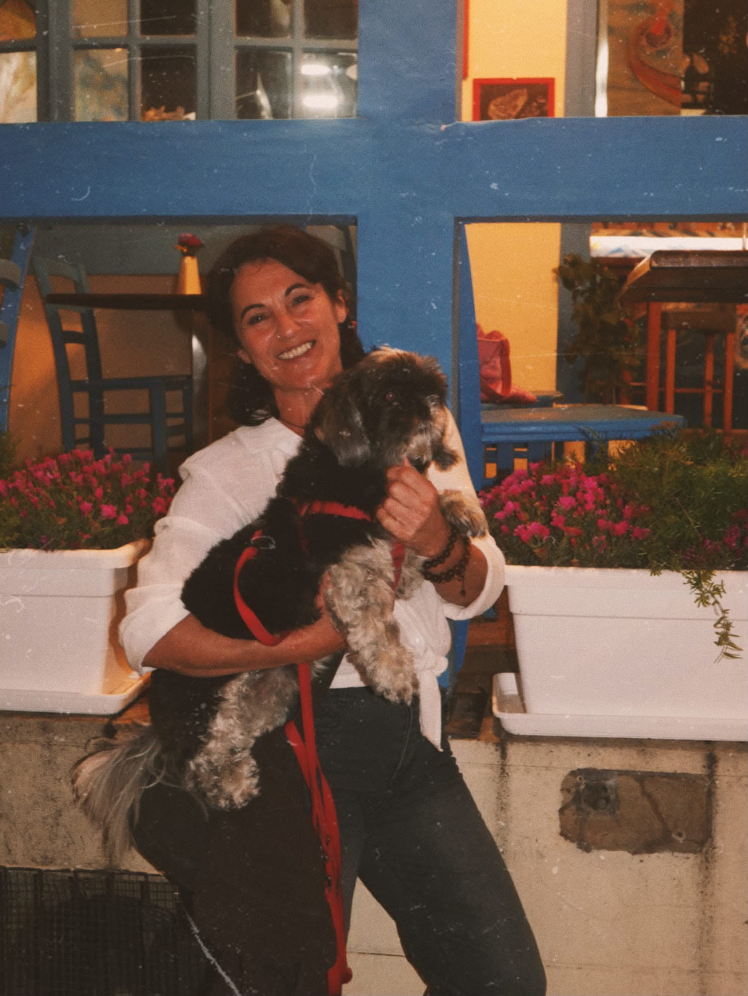 Guest with dog outside Forty Fishes